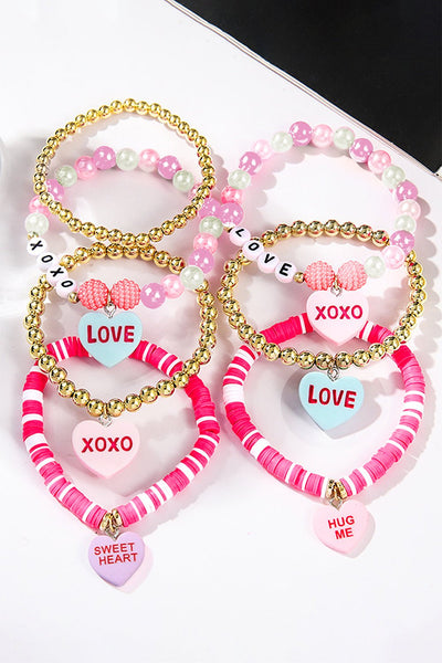 Women's Pink and Gold PMMA Heart Charm Stackable Bracelet Set with practical styling and dependable silhouette control.
