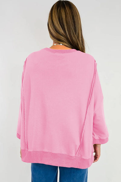 Women's Pink Floral Bow Sweatshirt with Exposed Seams and Slits with practical styling and dependable silhouette control.