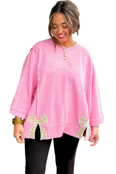 Women's Pink Floral Bow Sweatshirt with Exposed Seams and Slits with practical styling and dependable silhouette control.