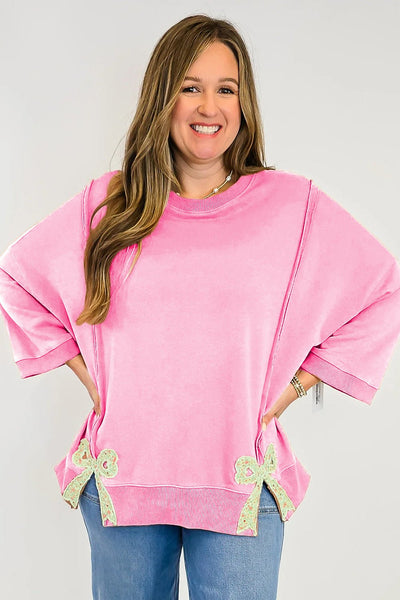 Women's Pink Floral Bow Sweatshirt with Exposed Seams and Slits with practical styling and dependable silhouette control.