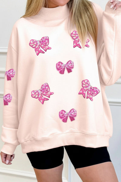 Women's Sequin Bow Mock Neck Sweatshirt in Apricot Pink