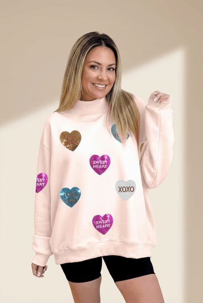 Women's Sequin Heart Mock Neck Sweatshirt in Apricot Pink