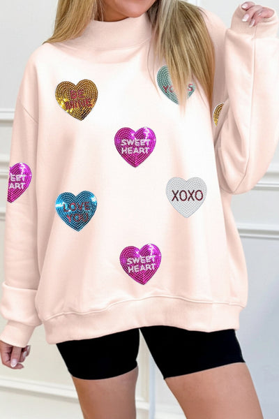 Women's Sequin Heart Mock Neck Sweatshirt in Apricot Pink