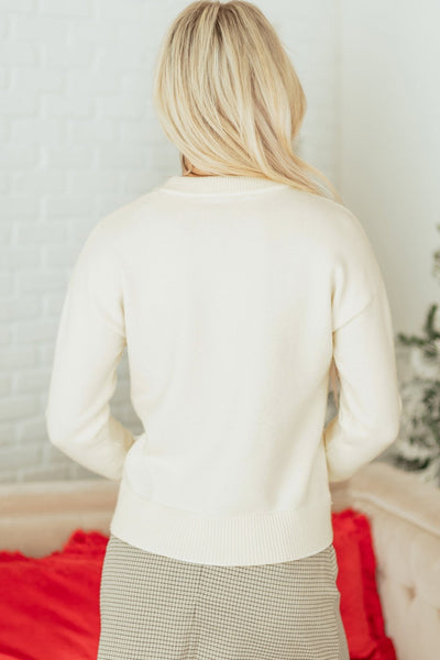Women's Sequined Bow Knit Holiday Sweater in Winter White